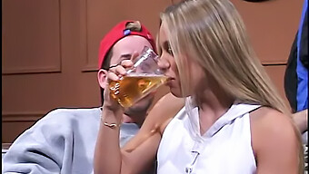 A Blonde Woman Mounts A Man'S Penis While Making Loud Sounds Of Pleasure In A Group Setting